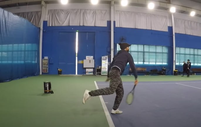 tips on how to serve in tennis: keep eyes focused ahead of you