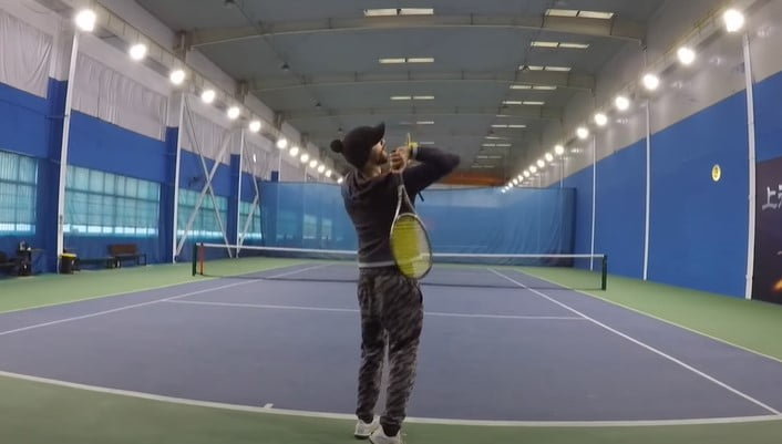 tips on how to serve in tennis: follow through after contact