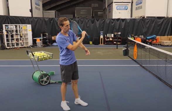 tennis how to make topspin curve: pronate your wrist 