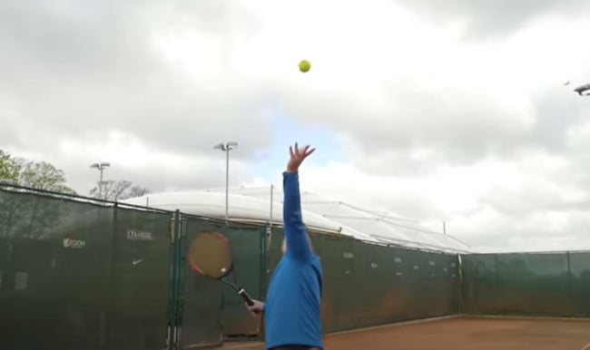 tennis how to practice second serves: the toss must be thrown over the head